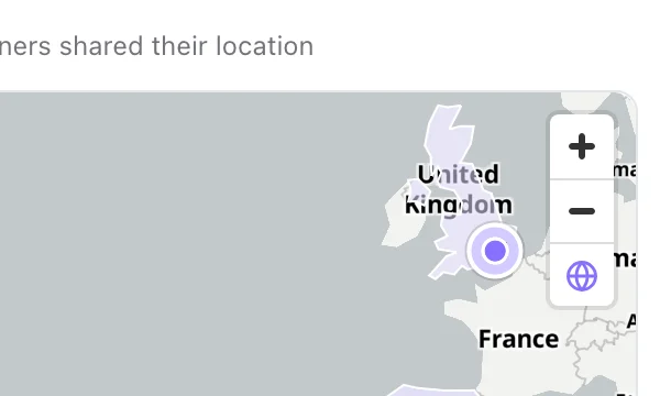 The globe button, under the zoom buttons at the top right of the Scans by Location map